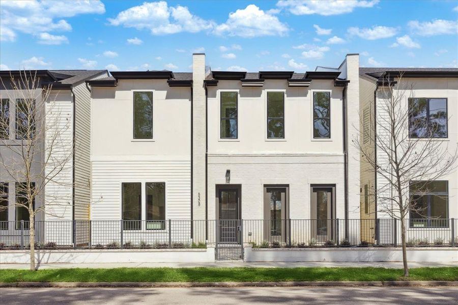 Exceptional Curb Appeal - This home comes with a well-proportioned handsome elevation. Elegant combination of hand slurred brick, painted carriage style garage door with a terracotta paver driveway.