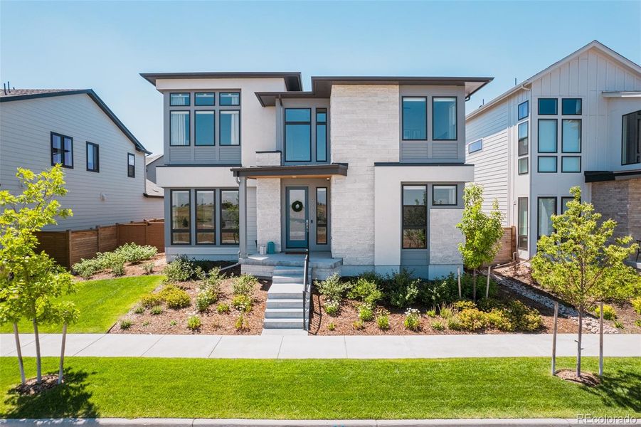 A grand entrance welcomes you into this exquisite home, where a soaring foyer and elegant design elements promise a living experience of unparalleled luxury and comfort.