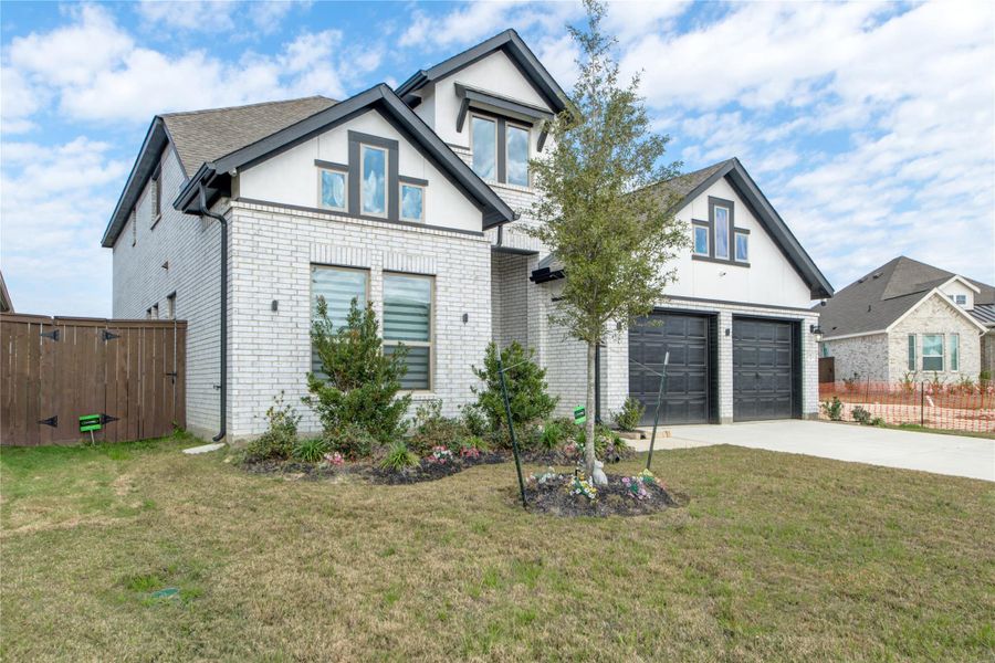 Front exterior of a new home in , New Caney, TX, highlighting curb appeal (Image 19). Front exterior of a new home in , New Caney, TX, highlighting curb appeal (Image 19).