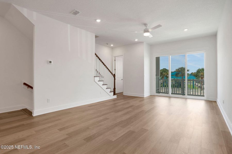 Spacious, unfurnished interior of a new home in North Beach Townhomes, Jacksonville Beach (Image 23).