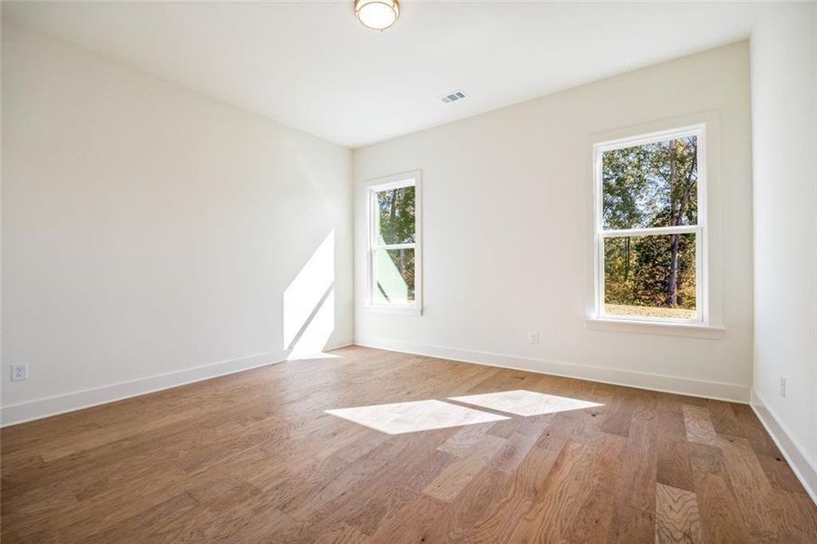 Spacious, unfurnished interior of a new home in Long Hollow Landing, Gainesville (Image 48).