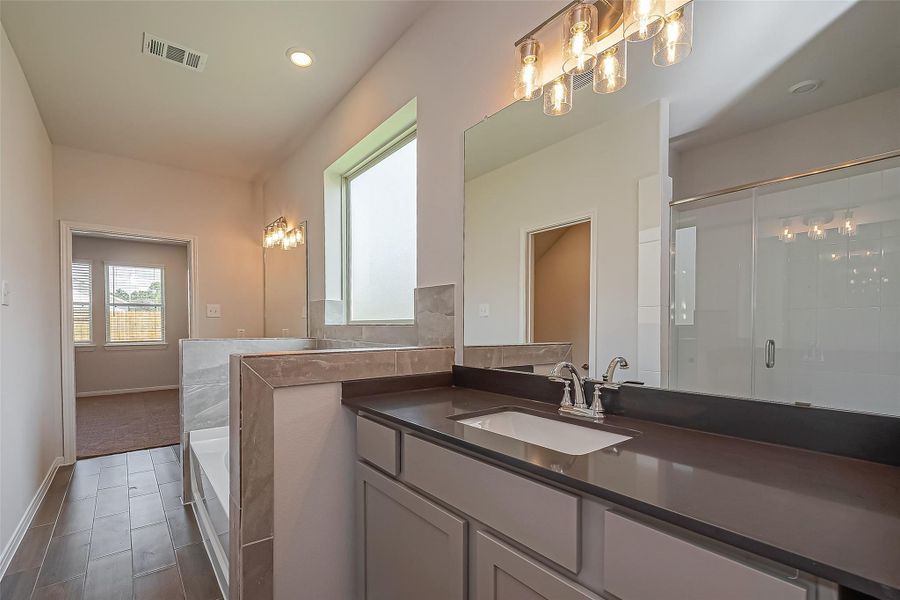 Furnished interior view inside a new home in Enclave At Dobbin, Magnolia (Image 10).