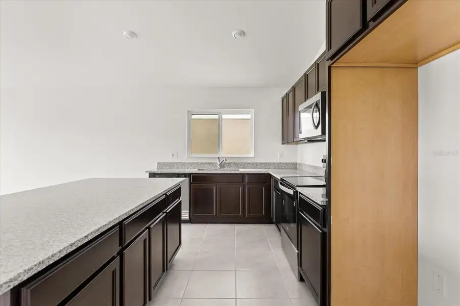Furnished interior view inside a new home in Reserve at Forest Lake II, Lake Wales (Image 5).
