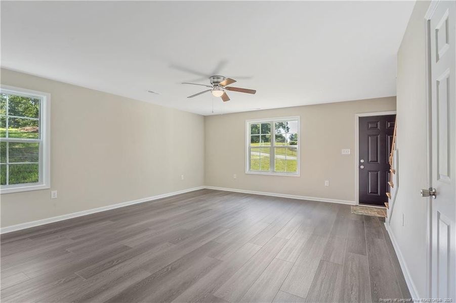 Large living area with coat closet