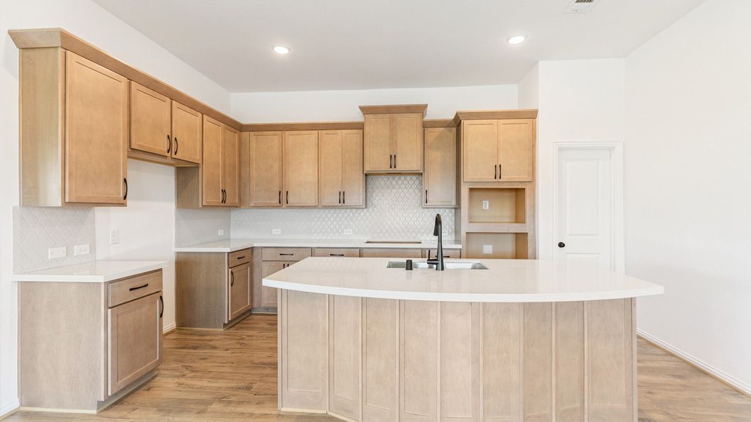 Furnished interior view inside a new home in Sunterra, Katy (Image 18).