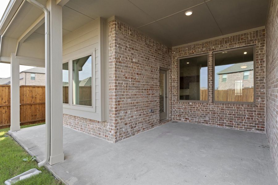 Exterior details and patio area of a home in River Ranch, Van Alstyne (Image 3). Exterior details and patio area of a home in River Ranch, Van Alstyne (Image 3).