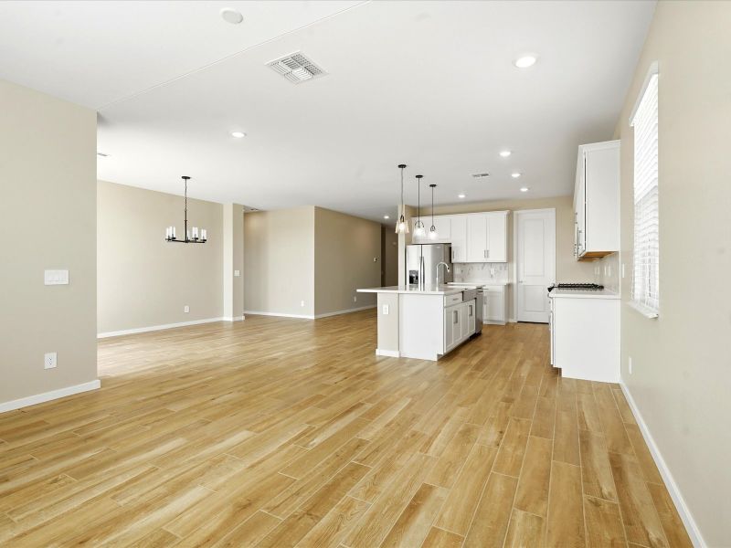 Spacious, unfurnished interior of a new home in White Tank Foothills Reserve Series, Waddell (Image 11).