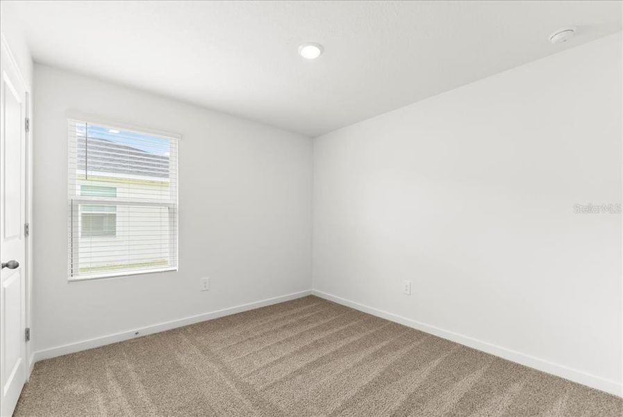 Spacious, unfurnished interior of a new home in Flagler Village - Classic Series, Palm Coast (Image 12). Spacious, unfurnished interior of a new home in Flagler Village - Classic Series, Palm Coast (Image 12).