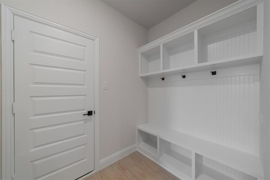 Mudroom featuring light hardwood / wood-style floors