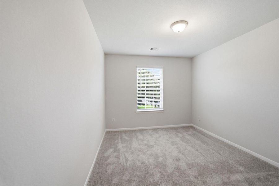 Spacious, unfurnished interior of a new home in Steed Landing, Texas City (Image 21).