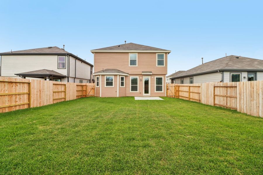Exterior details and patio area of a home in Bauer Meadows, Hockley (Image 19).