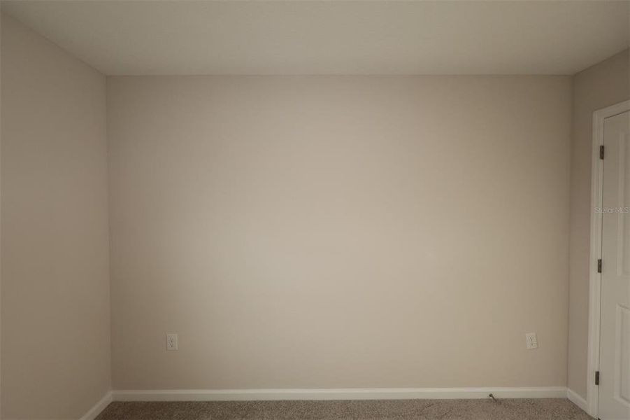 Spacious, unfurnished interior of a new home in Reeves Place, Orlando (Image 13).