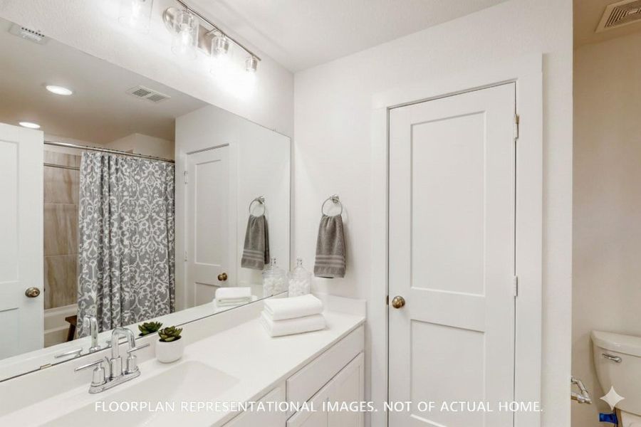 Furnished interior view inside a new home in Sorella, Tomball (Image 11).