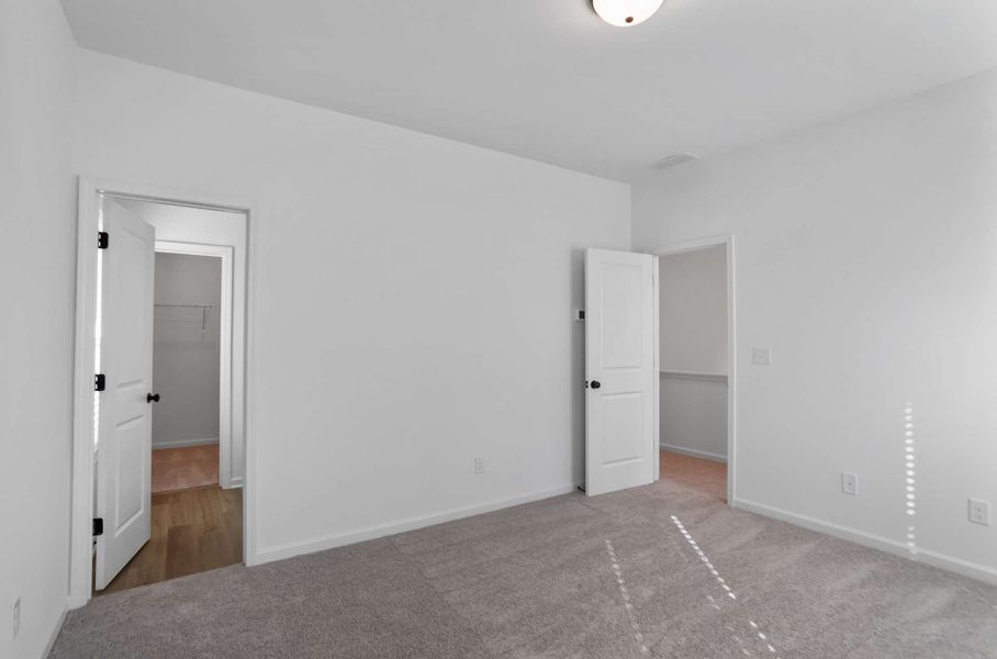 Representative unfurnished interior of a home built from the Khloe by KM Homes in The Cottages at Jackson Heights, Cleveland (Image 21).