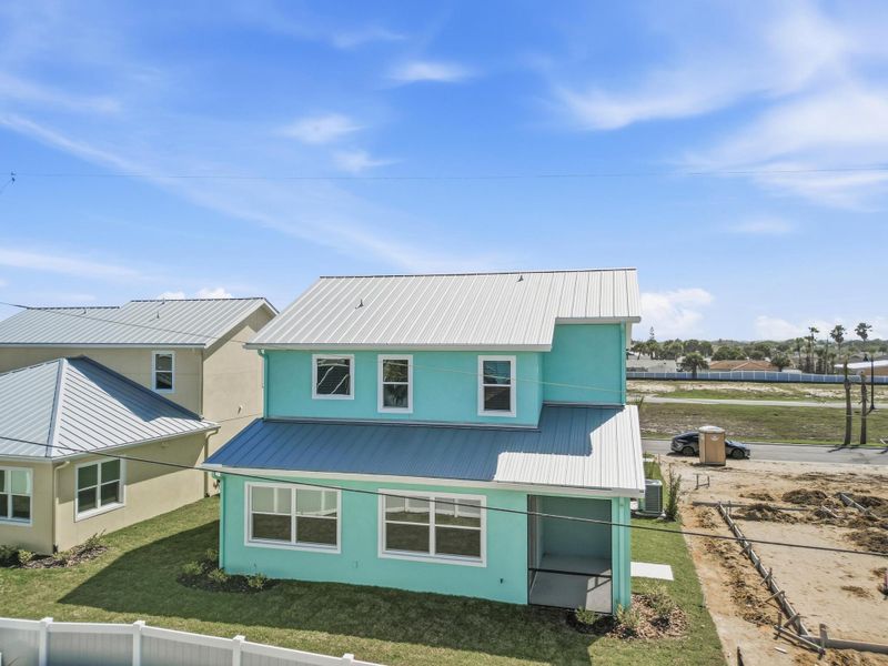 Exterior details and patio area of a home in Beachview Cove, Ormond Beach (Image 36).