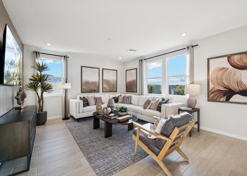 A living room with a large window.