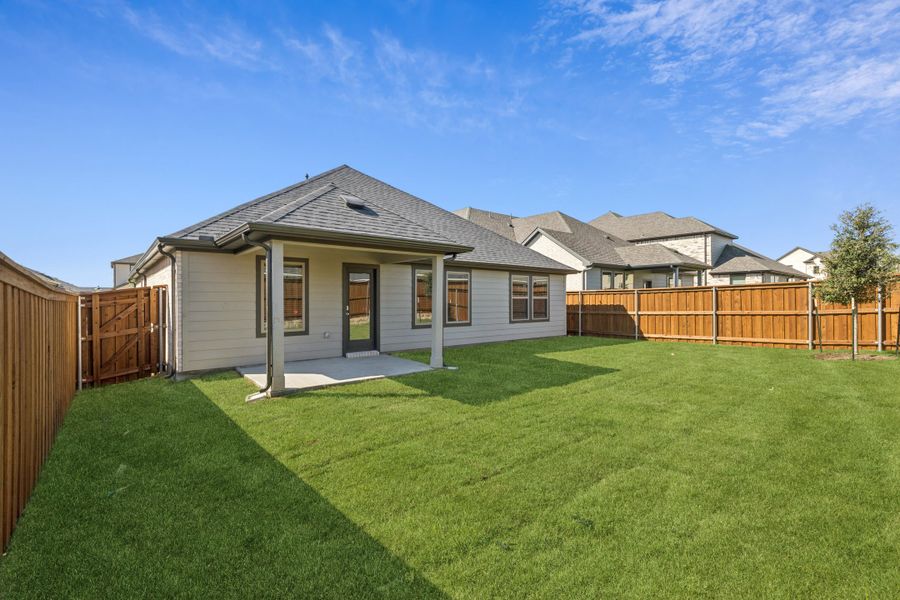 Covered Patio in the Emmy II home plan by Trophy Signature Homes - REPRESENTATIVE PHOTO Covered Patio in the Emmy II home plan by Trophy Signature Homes - REPRESENTATIVE PHOTO