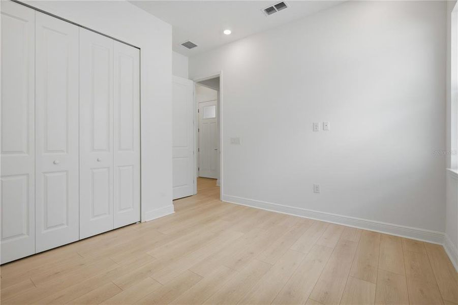 Spacious, unfurnished interior of a new home in Bella Collina, Montverde (Image 24).