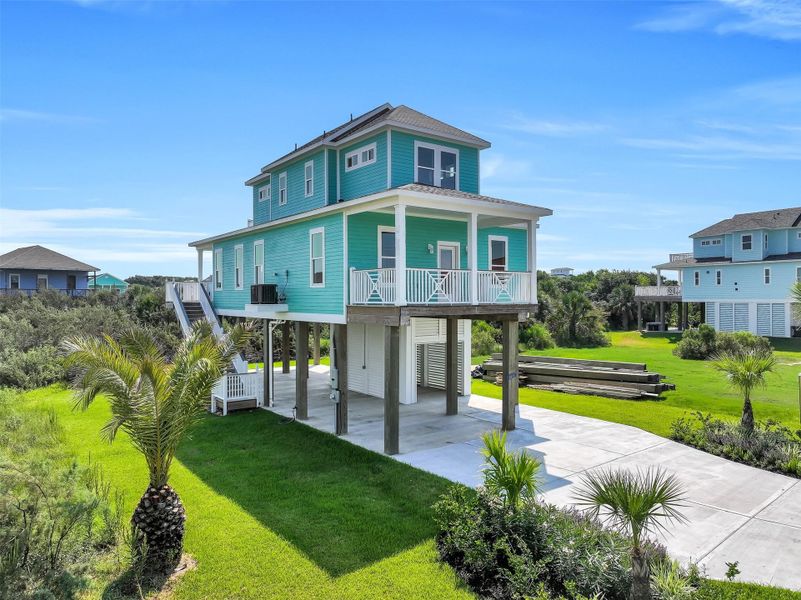 Front exterior of a new home in , Galveston, TX, highlighting curb appeal (Image 20). Front exterior of a new home in , Galveston, TX, highlighting curb appeal (Image 20).