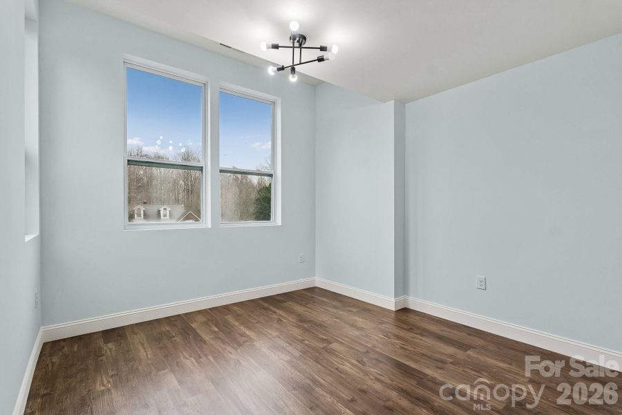 Large secondary bedroom facing the front of home with Jack and Jill full bathroom access