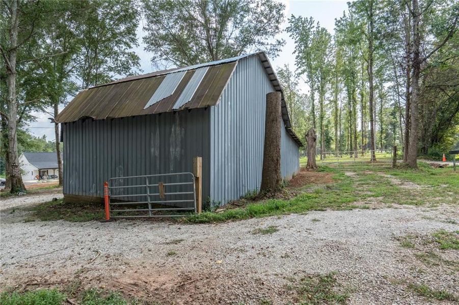Front exterior of a new home in , Carrollton, GA, highlighting curb appeal (Image 20).