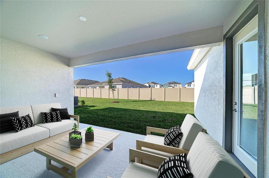 Exterior details and patio area of a home in Pasadena Woods, Wesley Chapel (Image 25).