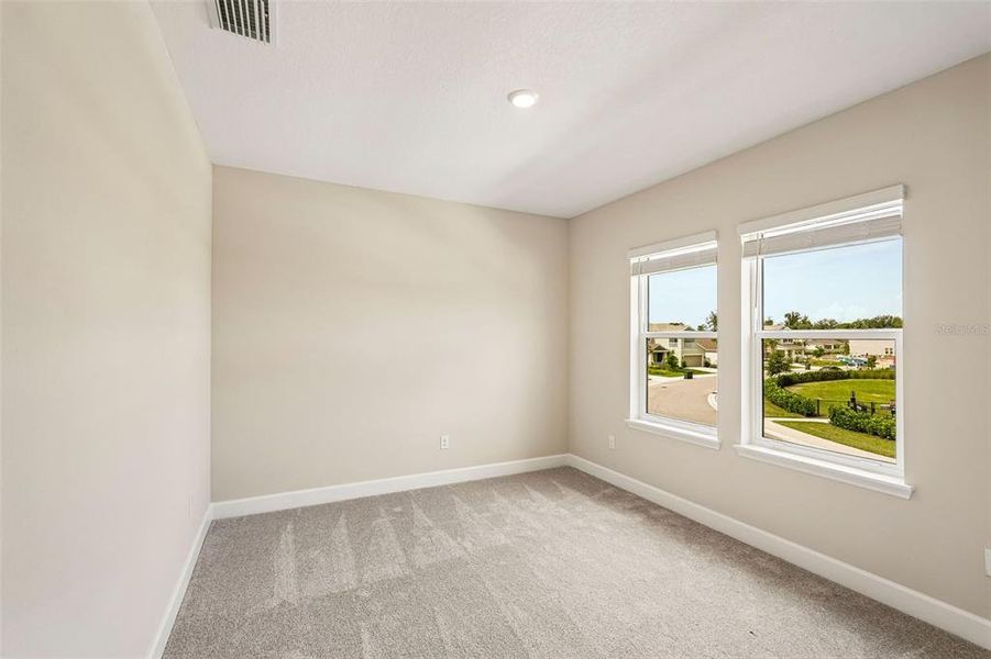 Spacious, unfurnished interior of a new home in Tiburon, Nokomis (Image 41).