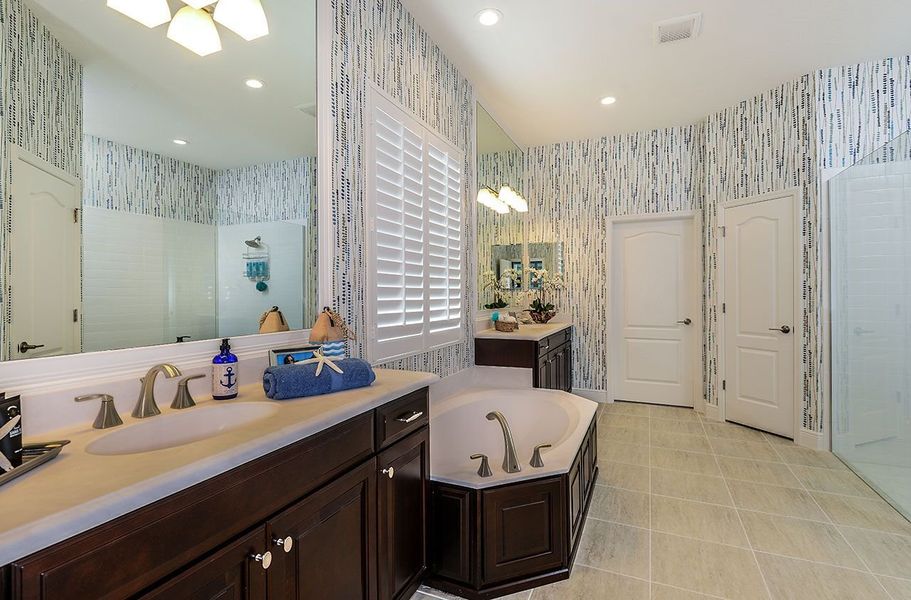 Representative furnished interior of a home built from the Kiawah 2 by Neal Communities in Verandah, Fort Myers (Image 21).