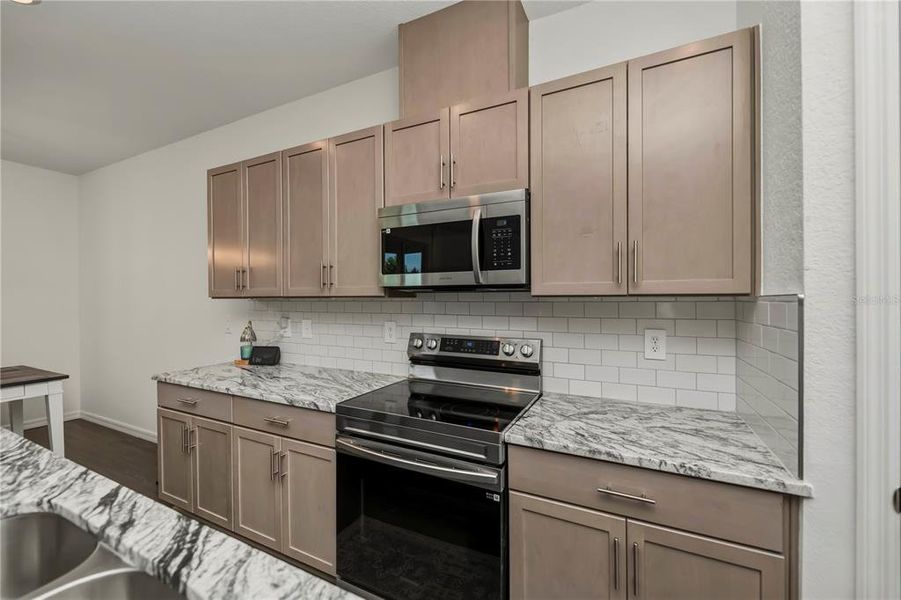 Furnished interior view inside a new home in , North Port (Image 40).