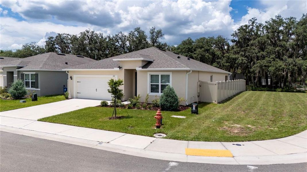 Front exterior of a new home in , Davenport, FL, highlighting curb appeal (Image 20). Front exterior of a new home in , Davenport, FL, highlighting curb appeal (Image 20).