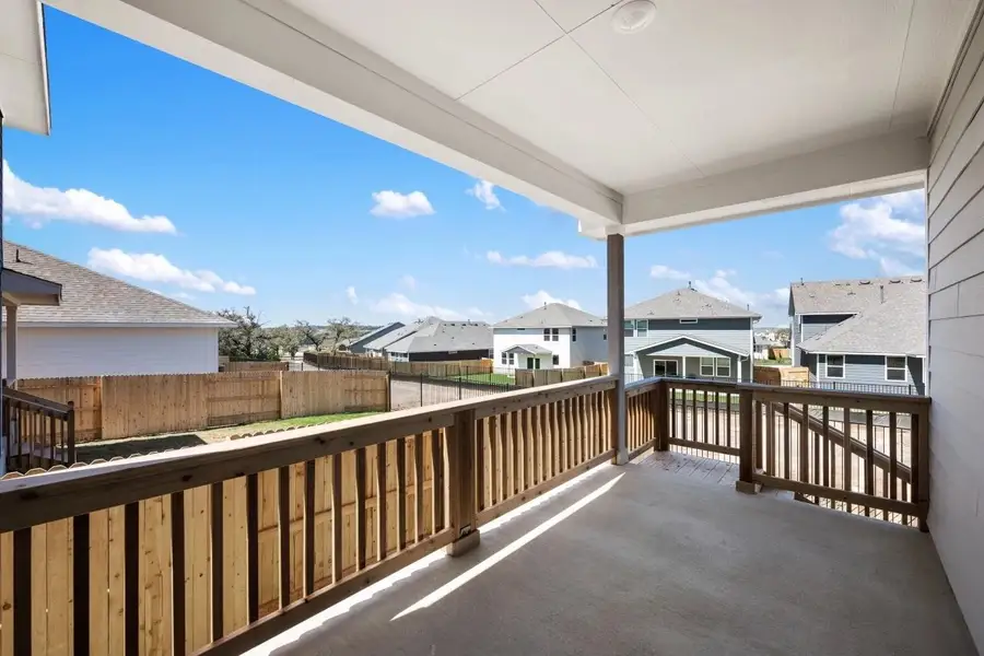 Exterior details and patio area of a home in Cannon Ranch, Dripping Springs (Image 3).