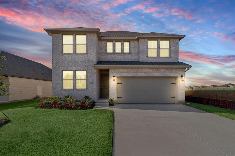 Front exterior of a new home in Heritage Ranch, Sherman, TX, highlighting curb appeal (Image 21). Front exterior of a new home in Heritage Ranch, Sherman, TX, highlighting curb appeal (Image 21).