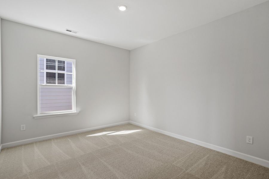 Spacious, unfurnished interior of a new home in Sweetbrier, Durham (Image 33).