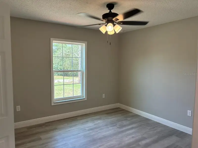 Spacious, unfurnished interior of a new home in , Dunnellon (Image 25).
