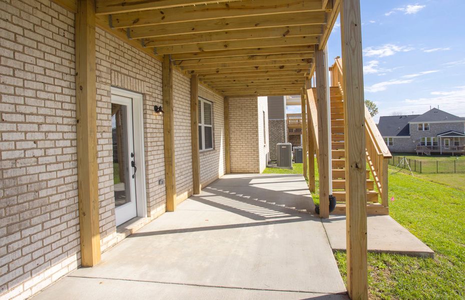 Exterior details and patio area of a home in Durham Farms, Hendersonville (Image 25).