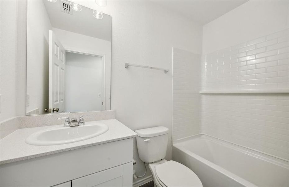 Secondary bathroom*real home pictured