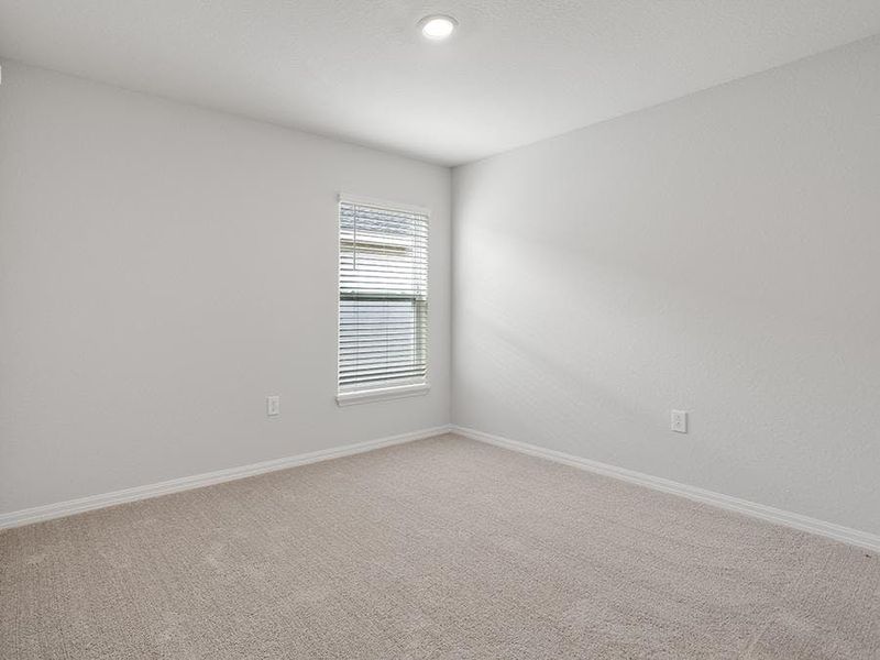 Secondary bedrooms provide space for everyone in your household - Remy by Highland Homes Secondary bedrooms provide space for everyone in your household - Remy by Highland Homes