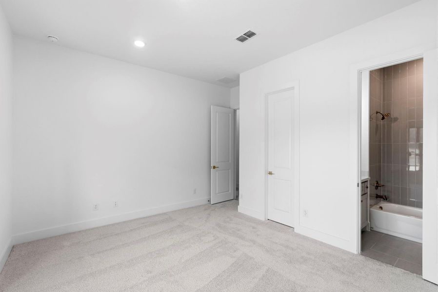 secondary bedroom with ensuite bathroom