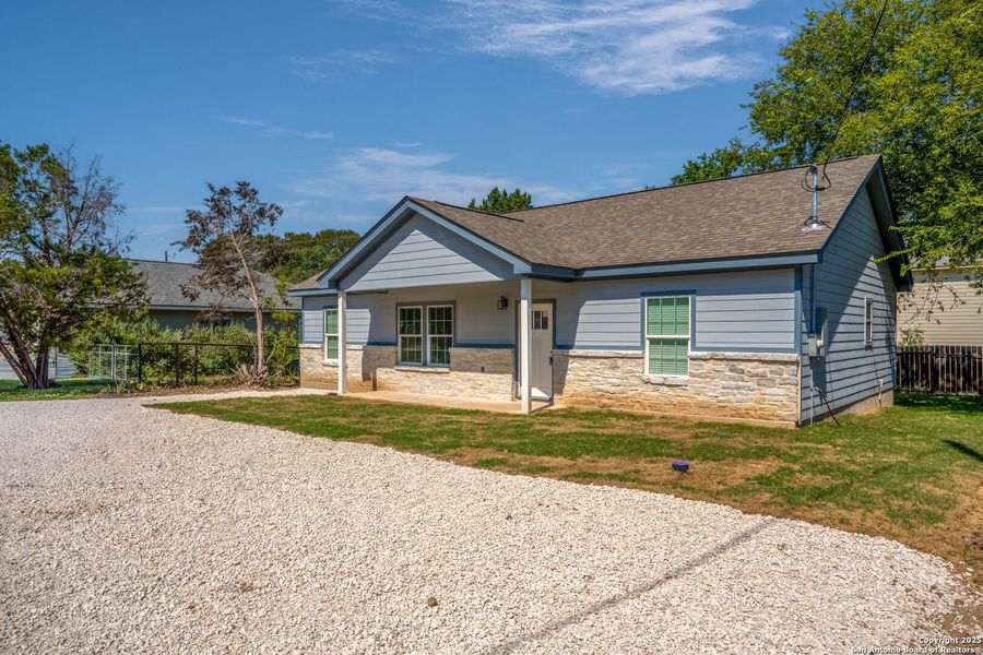 Front exterior of a new home in , Canyon Lake, TX, highlighting curb appeal (Image 2). Front exterior of a new home in , Canyon Lake, TX, highlighting curb appeal (Image 2).