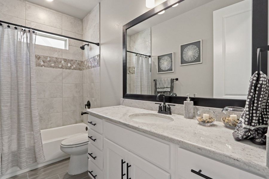 Representative furnished interior of a home built from the Pershing by Hakes Brothers in Paseo Del Este, El Paso (Image 38).