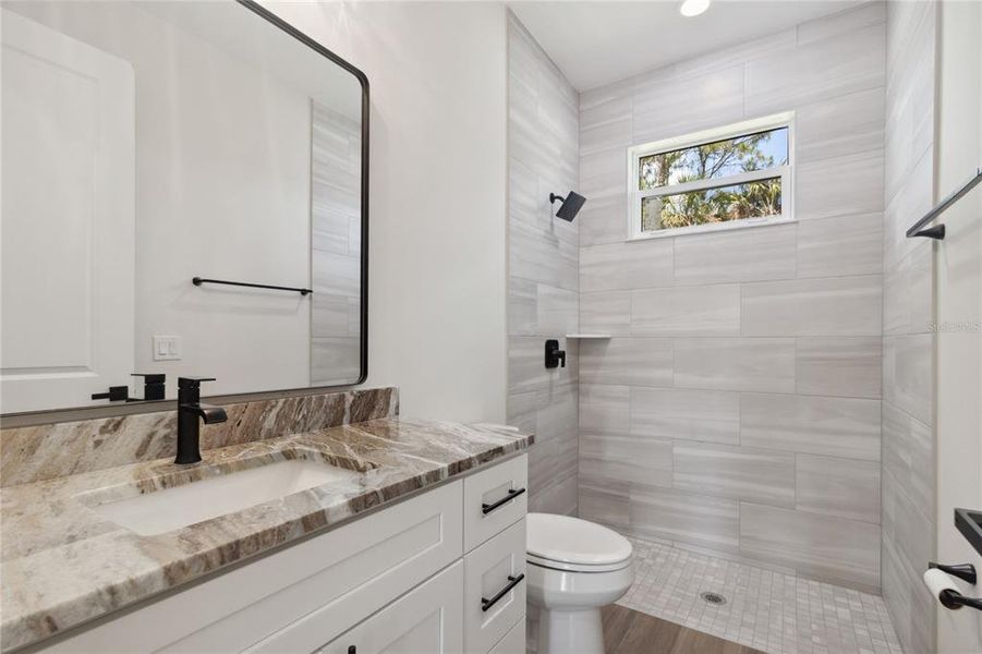 3rd Bathroom- This bathroom has a door to the lanai-