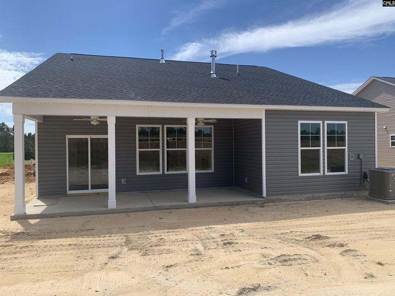 Front exterior of a new home in Peachtree Hills, Lexington, SC, highlighting curb appeal (Image 2).