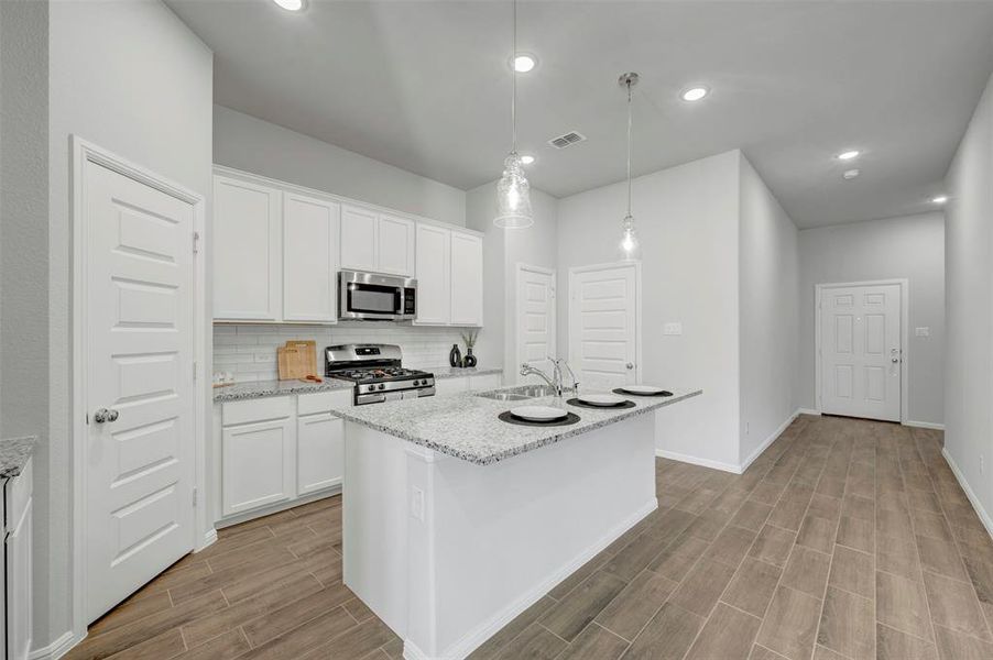 Furnished interior view inside a new home in Sagebrook, Argyle (Image 9). Furnished interior view inside a new home in Sagebrook, Argyle (Image 9).