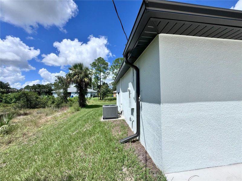 Exterior details and patio area of a home in , Lehigh Acres (Image 3). Exterior details and patio area of a home in , Lehigh Acres (Image 3).