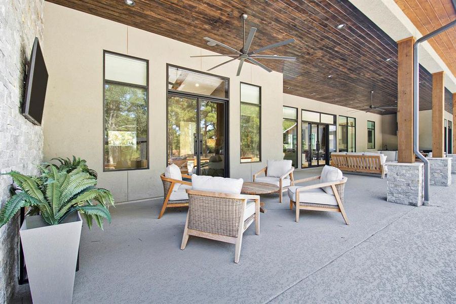 Full view of this luxurious backyard patio.