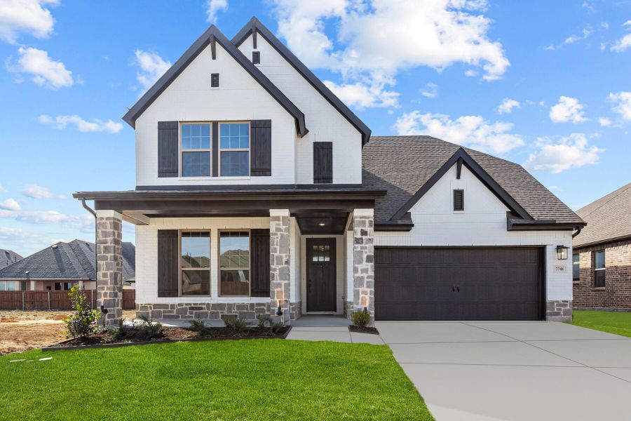 Representative exterior photo of a completed home built from the The Malinda by David Weekley Homes in Sandbrock Ranch, Aubrey, TX (Image 1).