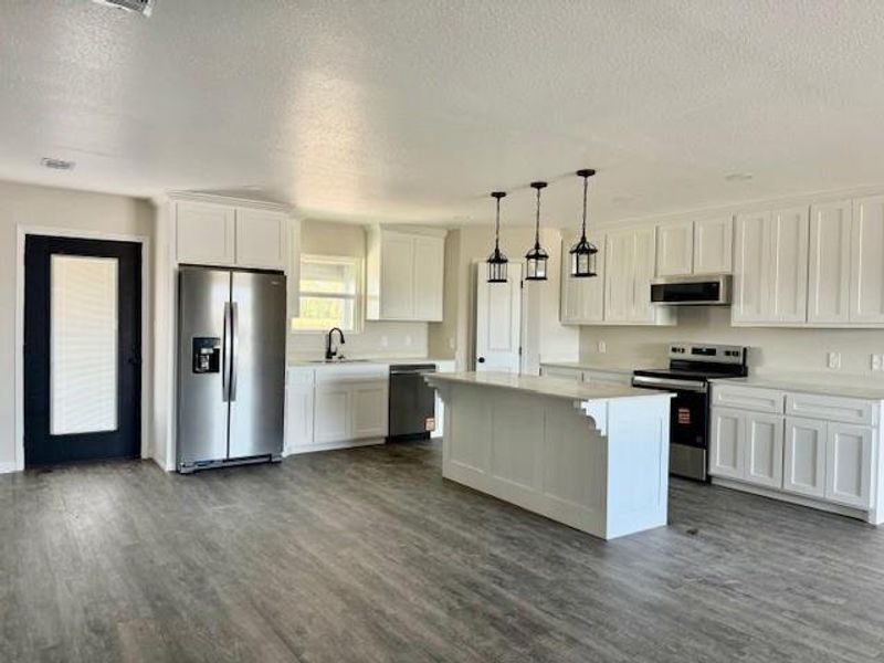 Furnished interior view inside a new home in , Honey Grove (Image 5).