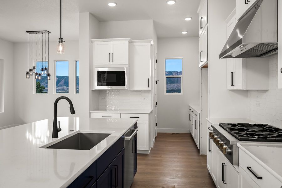 Furnished interior view inside a new home in Cloverleaf - Pinnacle Collection, Monument (Image 9).