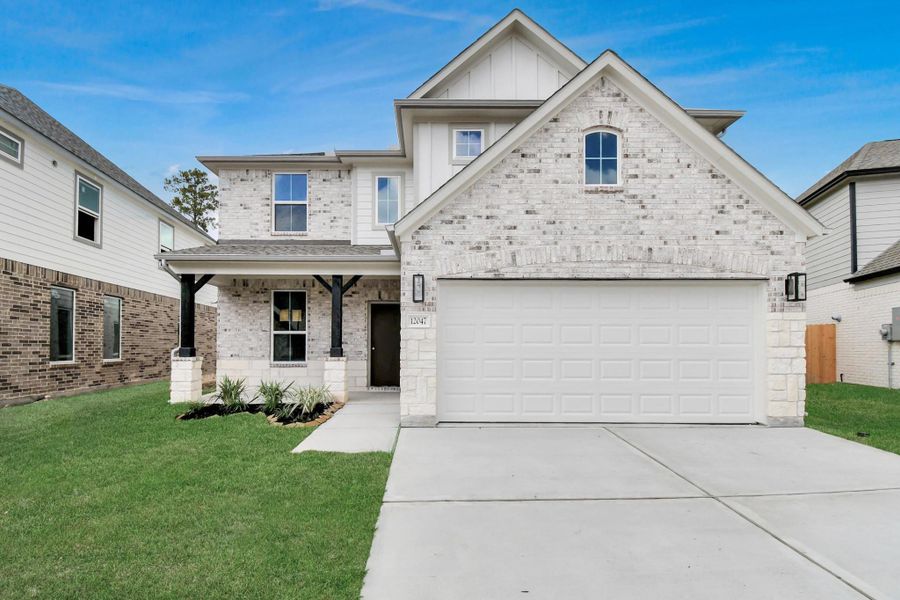 This home boasts lush green grass and meticulous landscaping. Its premium elevation showcases an exquisite blend of brick and stone features, complemented by modern coach lighting. This home boasts lush green grass and meticulous landscaping. Its premium elevation showcases an exquisite blend of brick and stone features, complemented by modern coach lighting.