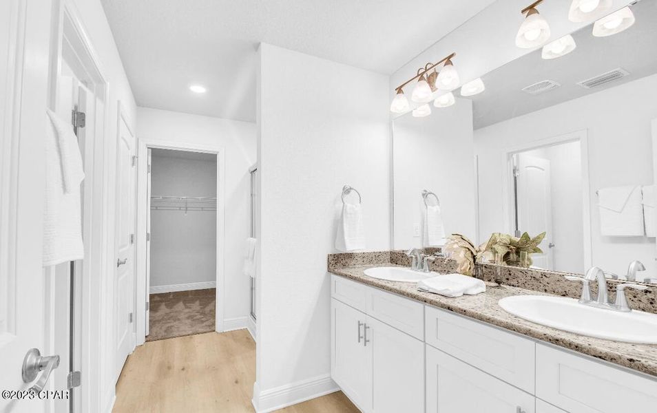 Representative furnished interior of a home built from the Plan 1520 by Adams Homes in East Bay, Panama City (Image 11).